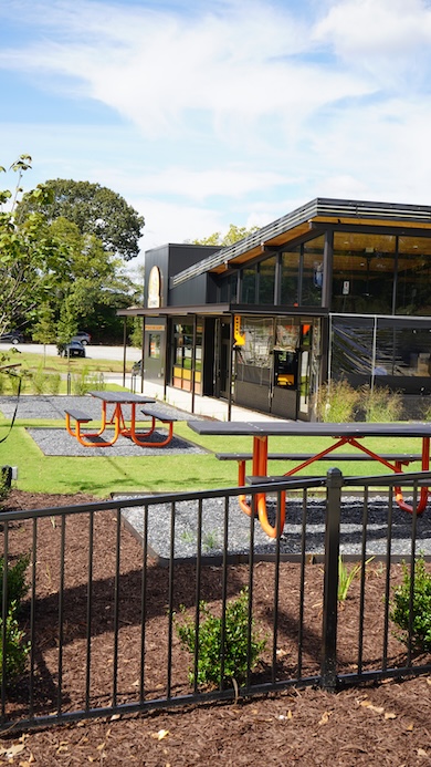 Steel fencing around the outdoor dining patio at Cafe Racer Coffee + Donuts in Athens, GA